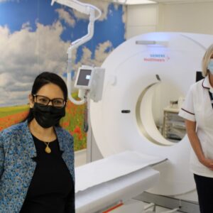 Xanthe Clemons MRI/CT Lead briefs Priti Patel about the new CT scanner