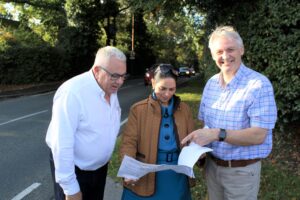 Cllr Mark Durham (left) and Priti Patel MP with concerned local resident, Andrew Reid, during her inspection of accident blackspots on Witham Road, Wickham Bishops.