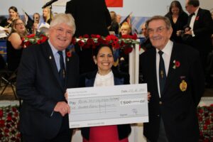 Priti presents a cheque for £500 to the RBL Witham Branch Chairman, Col. Charles Thomas (left) and its President, Mike Sharpe.