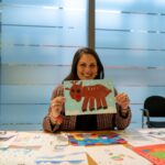 Priti Patel picking the winning entry in her annual Christmas card competition.