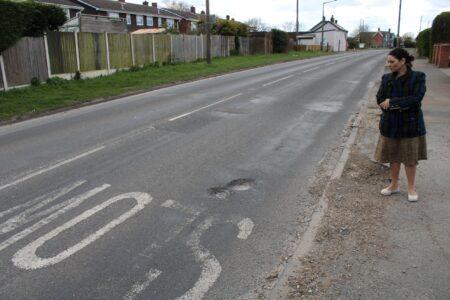 Deep potholes on the Maldon Road, just past the New Times Public House.