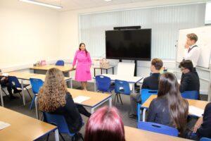 Priti Patel talks to GCSE Citizenship students at The Stanway School with Head Teacher Jonathan Bland
