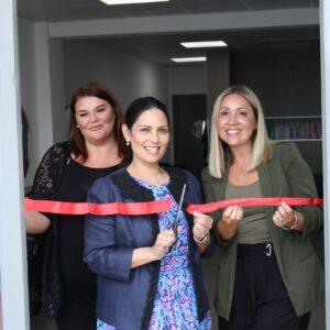 Priti Patel with Jade Pain (Manager) (left) and Kerry Bush (owner) cuts the ribbon to formally open the Feathers Hair Salon, Tiptree.